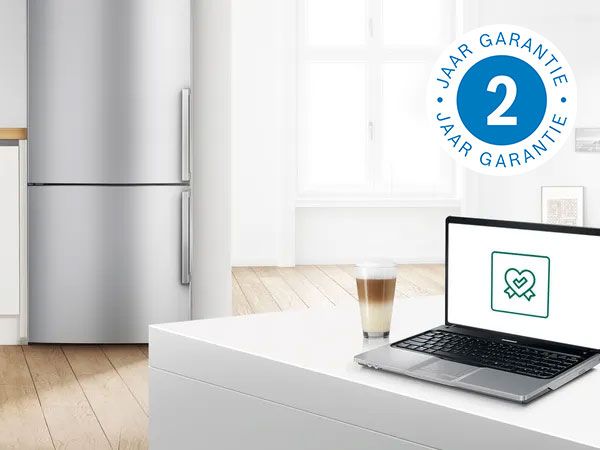 Keukenapparatuur, laptop, koffie, 2 jaar garantie, modern interieur.