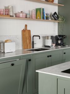 Sage green kitchen setting