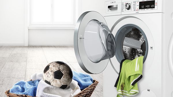 Brightly coloured, extra-clean terrycloth items soaking in water.