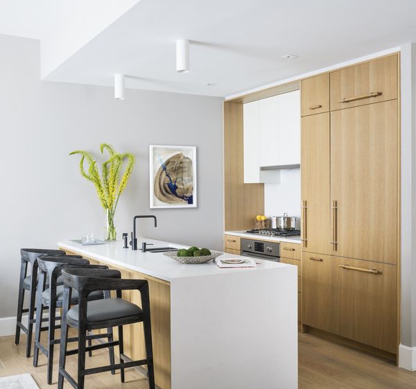 Bosch panel-ready refrigerator with matching cabinets