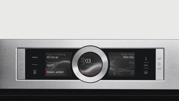 Stainless steel appliance control panel with digital display, temperature controls, and heating indicators. 