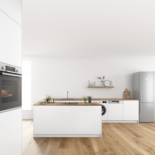 White minimalist kitchen layout with different appliances